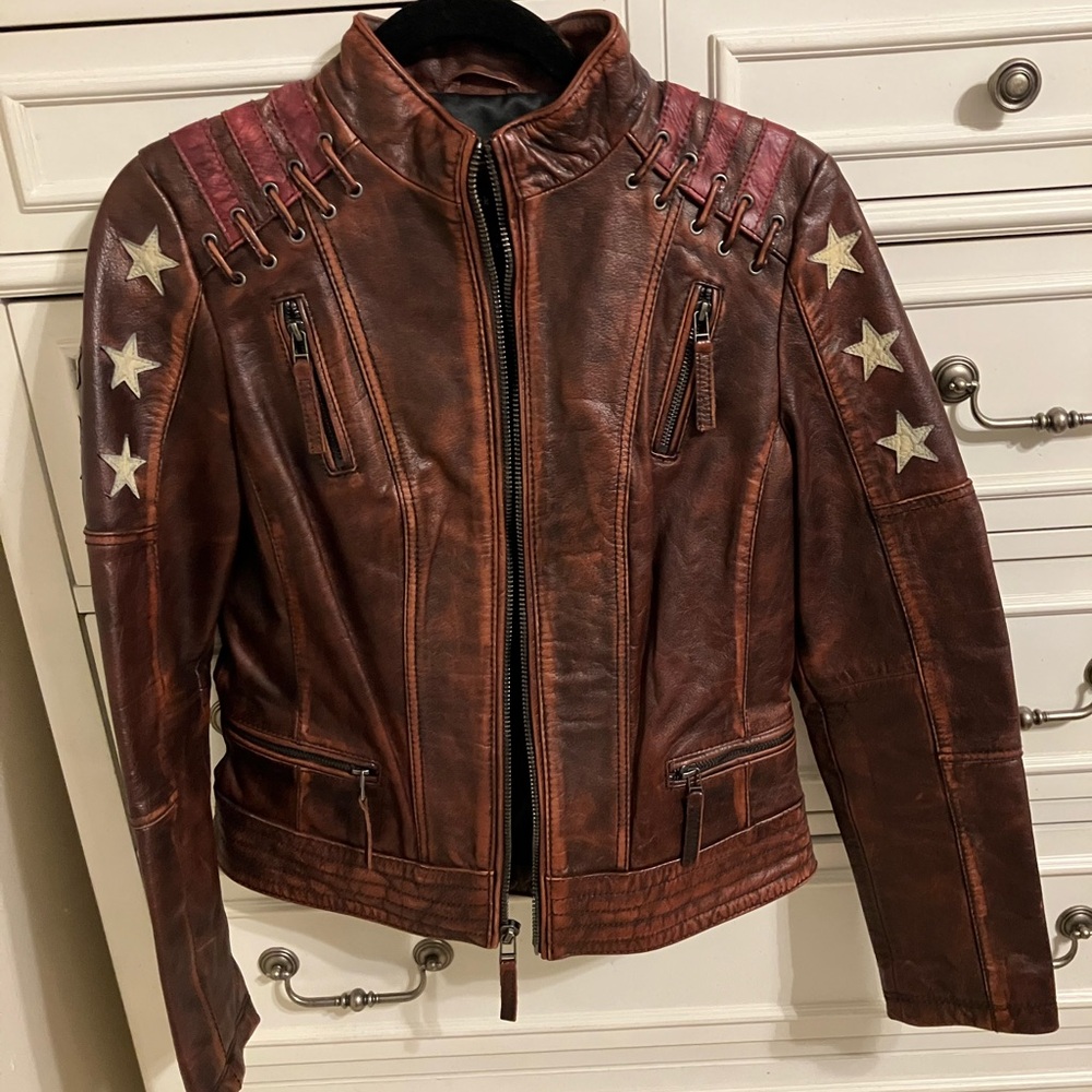 Red leather jacket. Like times.  I had on 4 times. Size S. Excellent condition